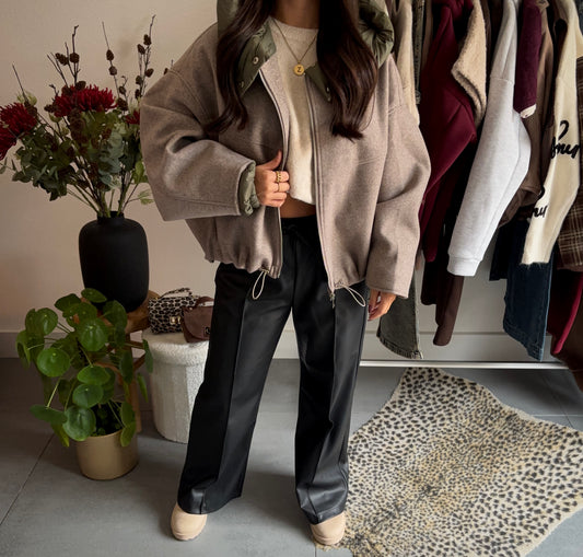 Reversible utility bomber jacket